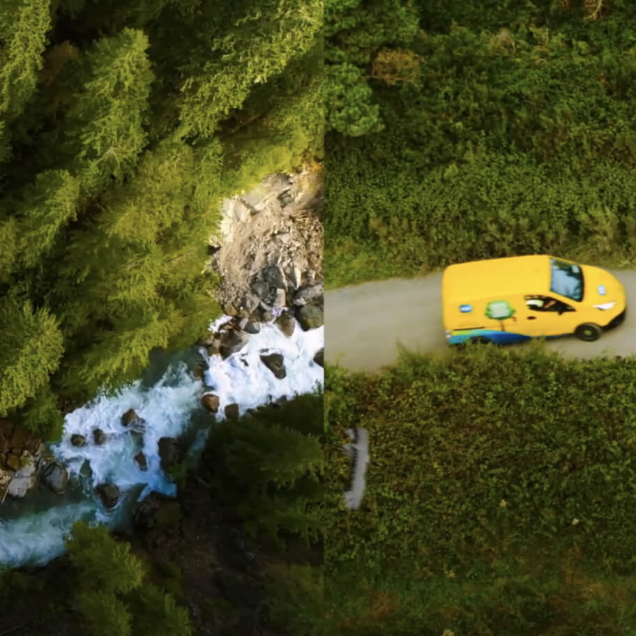 Birdview of a water stream on one side next to a road with an ESB Networks van