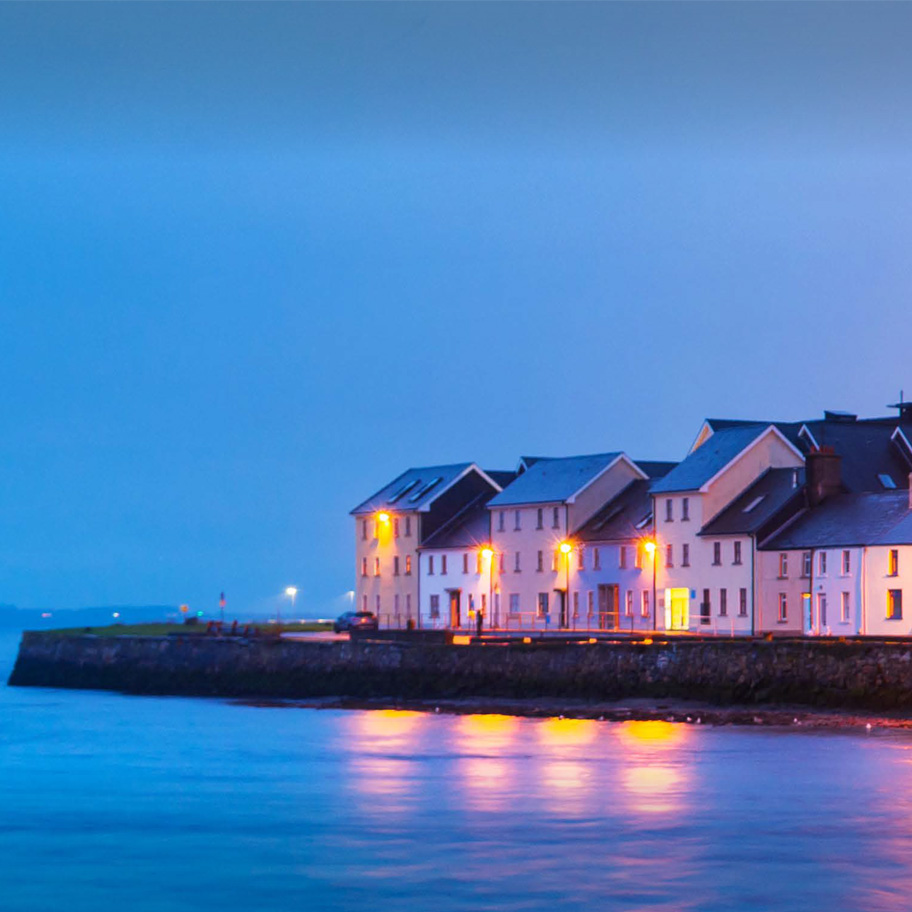 Picture of a row of residential houses in low lighting