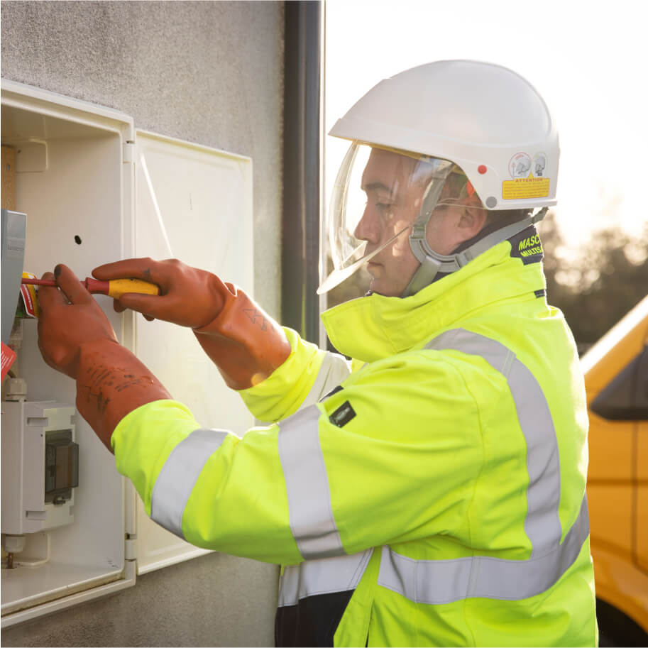 Technician fixing a meter box