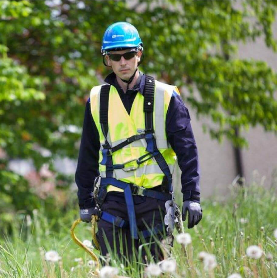 Technician walking on a farm field