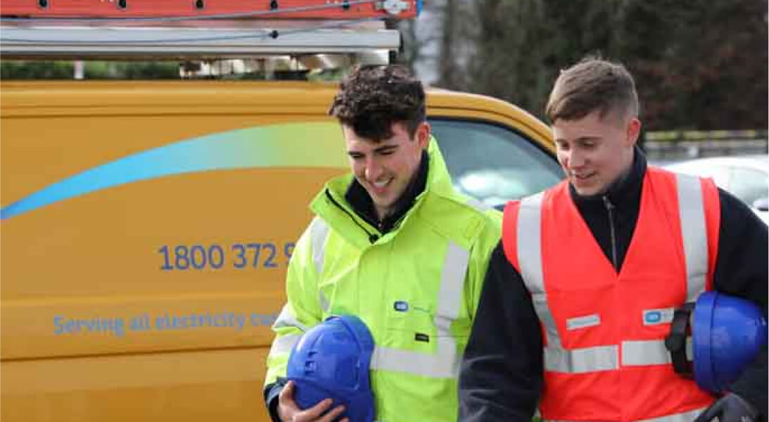 Apprentices chatting and smiling