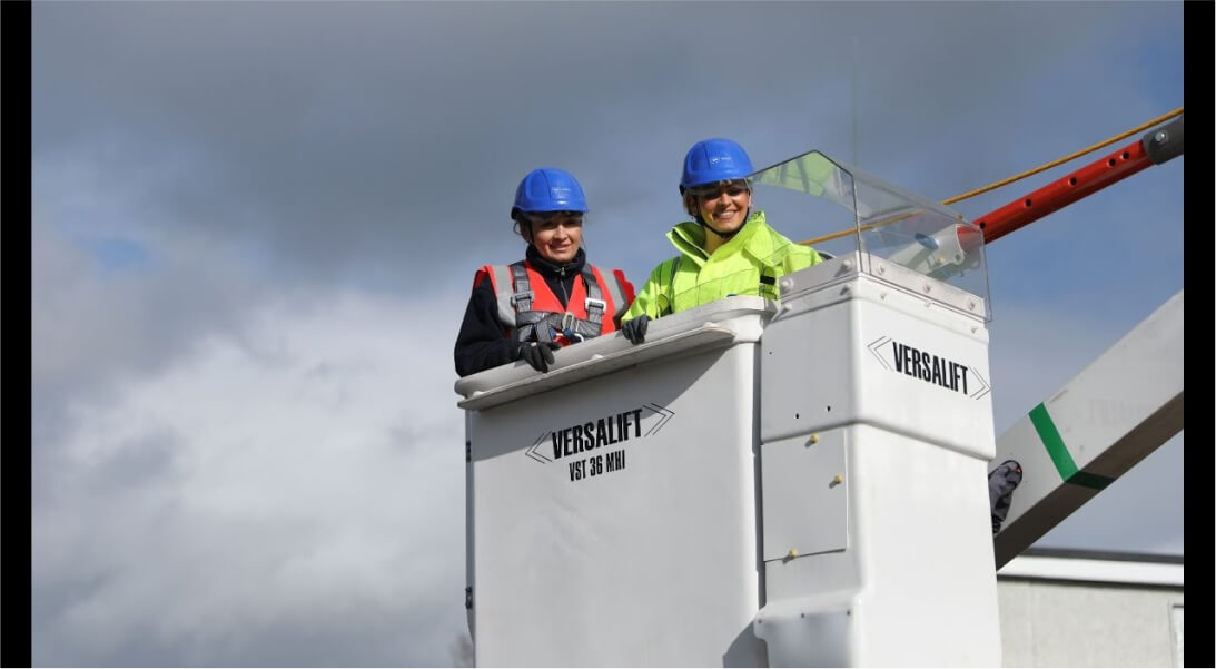 Technicians in a cherry picker